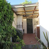 Enclosed braai area at the side of the kitchen